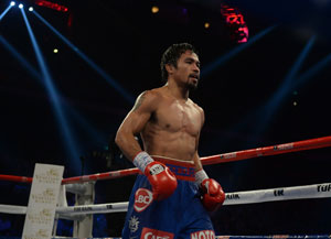 Boxer Manny Pacquiao's comeback victory lifts spirits of typhoon-ravaged Philippines