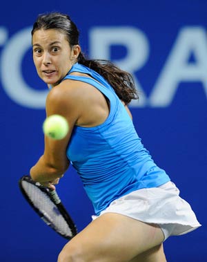 Bartoli rallies to beat Morita in Tokyo