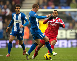 Wigan holds QPR to 2-2 draw in Premier League
