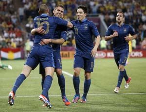 Euro 2012: France brave storm to bring Ukraine down to earth