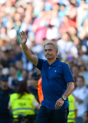 Jose Mourinho exits Real Madrid with win, boos; Barcelona hit 100 points