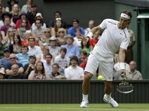 Rafael Nadal survives scare to ease into Wimbledon second round