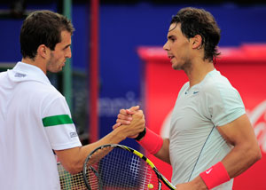 Rafael Nadal does double duty to reach Barcelona Open semis