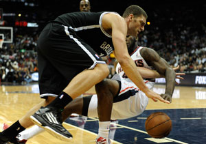 Nets beat Hawks to keep up Atlantic race