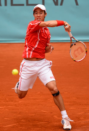 Japan's Nishikori knocks Federer out of Madrid Masters