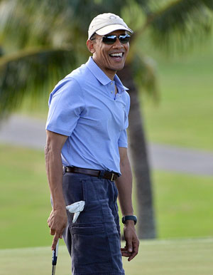 Barack Obama 'tees off' Christmas vacation