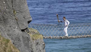 Olympic torch spotlights Northern Ireland coast