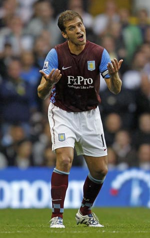 Aston Villa's Petrov retires after leukaemia diagnosis