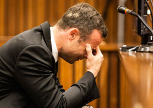 Oscar Pistorius murder trial: In rare statement, athlete says it's a 'tough time'