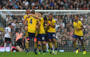 Lukas Podolski, Olivier Giroud score as Arsenal FC renaissance continues at Fulham