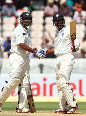 Who will open with Murali Vijay