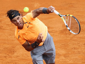 Nadal beats Nieminen to ease knee worries