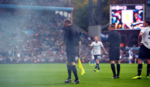 Referee hit by flare in Aston Villa-Tottenham game