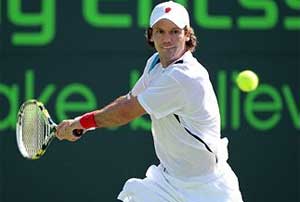 Mello upsets 5th-seeded Isner at Serbia Open