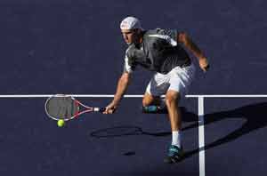 Ginepri bounces back from losing first set to win