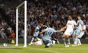 Aguero scores twice on debut for Manchester City