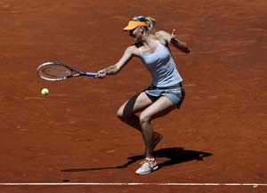 Maria Sharapova makes winning start in Madrid
