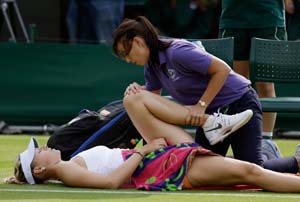 Wild day at Wimbledon: Roger Federer, Maria Sharapova lose