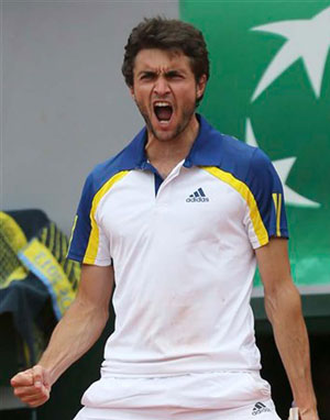 French Open: Gilles Simon rallies past Lleyton Hewitt in first round