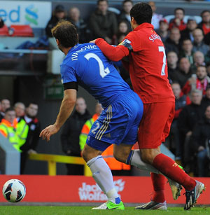 Luis Suarez apologises for biting Ivanovic