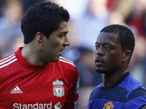 Suarez charged with racially abusing Evra