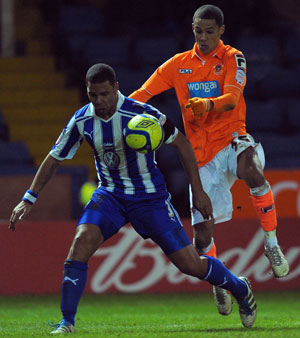 Tom Ince suspended over insulting gesture