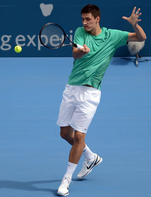 Bernard Tomic knocks out defending champion Jarkko Nieminen