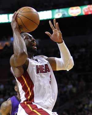 Dwayne Wade takes Heat past Magic