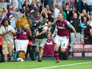 Loan star Andy Carroll helps West Ham nail Fulham