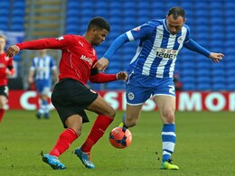 Wigan Athletic keep up FA Cup defense by beating Cardiff City Wigan Athletic keep up FA Cup defense by beating Cardiff City