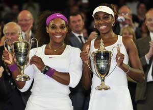 Williams sisters claim Wimbledon doubles title