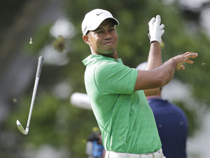 Jim Furyk, Graeme McDowell share the lead as Tiger Woods tumbles